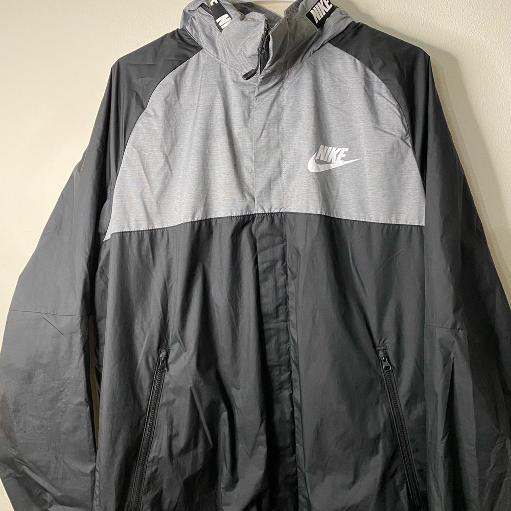 Gray and black nike windbreaker size L